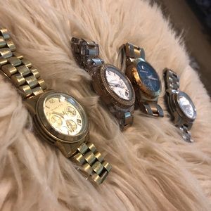 Set of 4 Michael Kors watches. Will sell separate